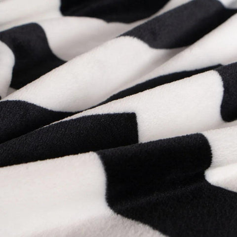 Ntbay Soft and Cozy Flannel Throw Blanket, Warm and Lightweight Bed Blanket with Black and White Pattern