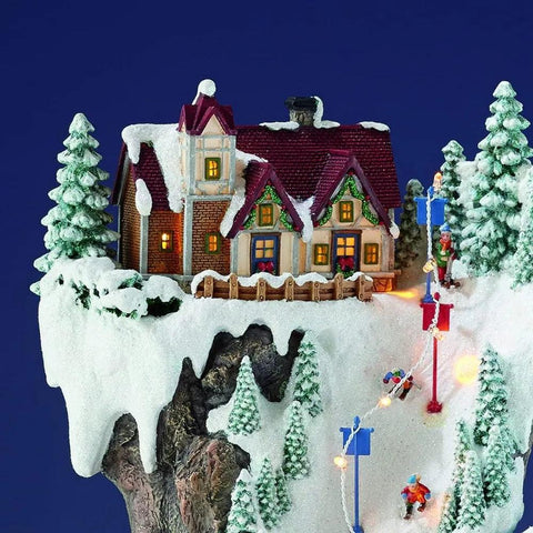 20.5“H Ski Resort Mountain Resin Christmas Village Buildings, Featuring LED Lights, Christmas Music, and Animated Train.