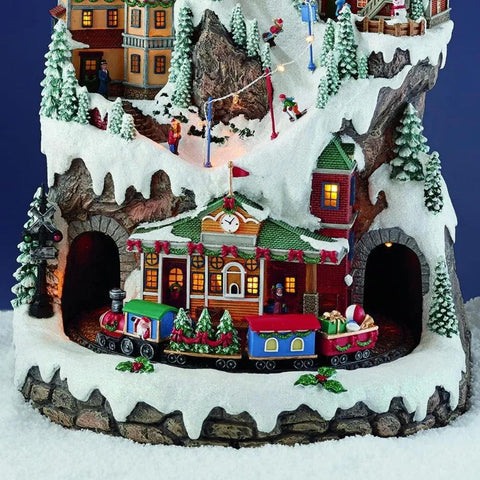 20.5“H Ski Resort Mountain Resin Christmas Village Buildings, Featuring LED Lights, Christmas Music, and Animated Train.