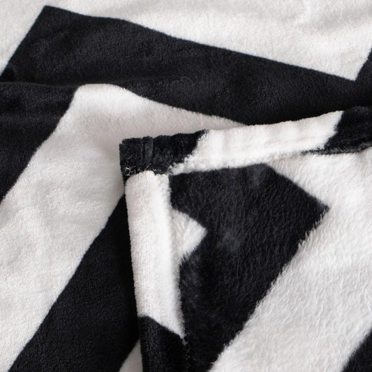 Ntbay Soft and Cozy Flannel Throw Blanket, Warm and Lightweight Bed Blanket with Black and White Pattern